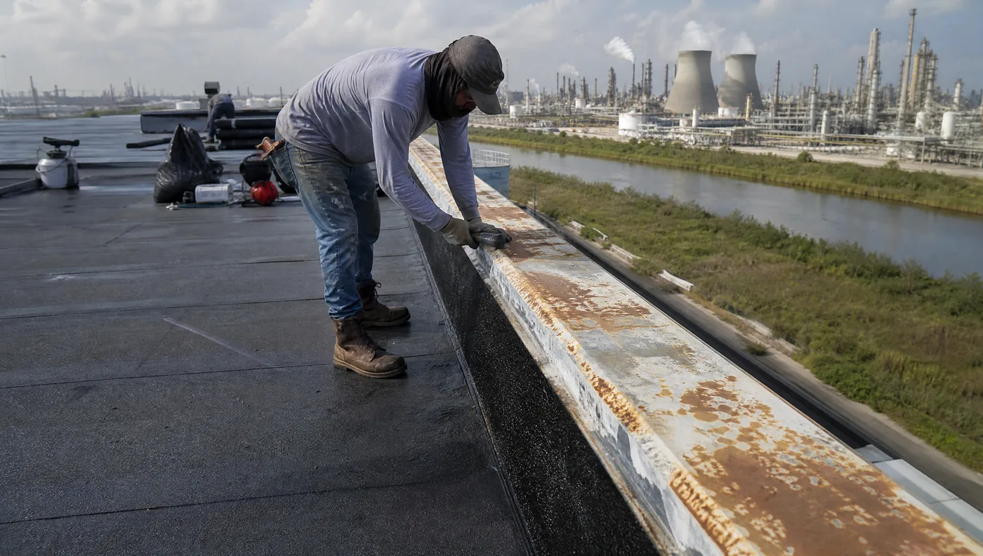 Refinery-adjacent industrial building roofs in Baytown, Texas