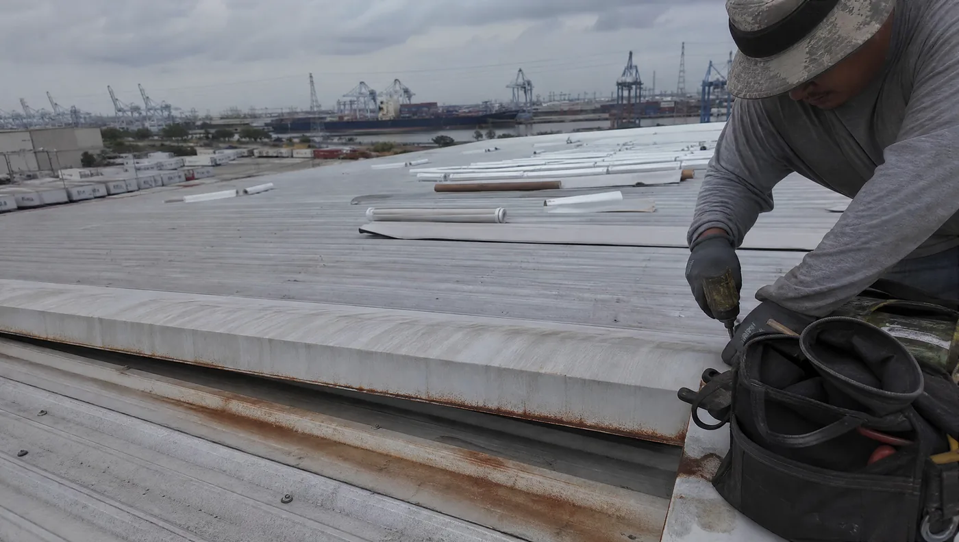 Large distribution warehouse roof near the Houston Ship Channel in Channelview, Texas