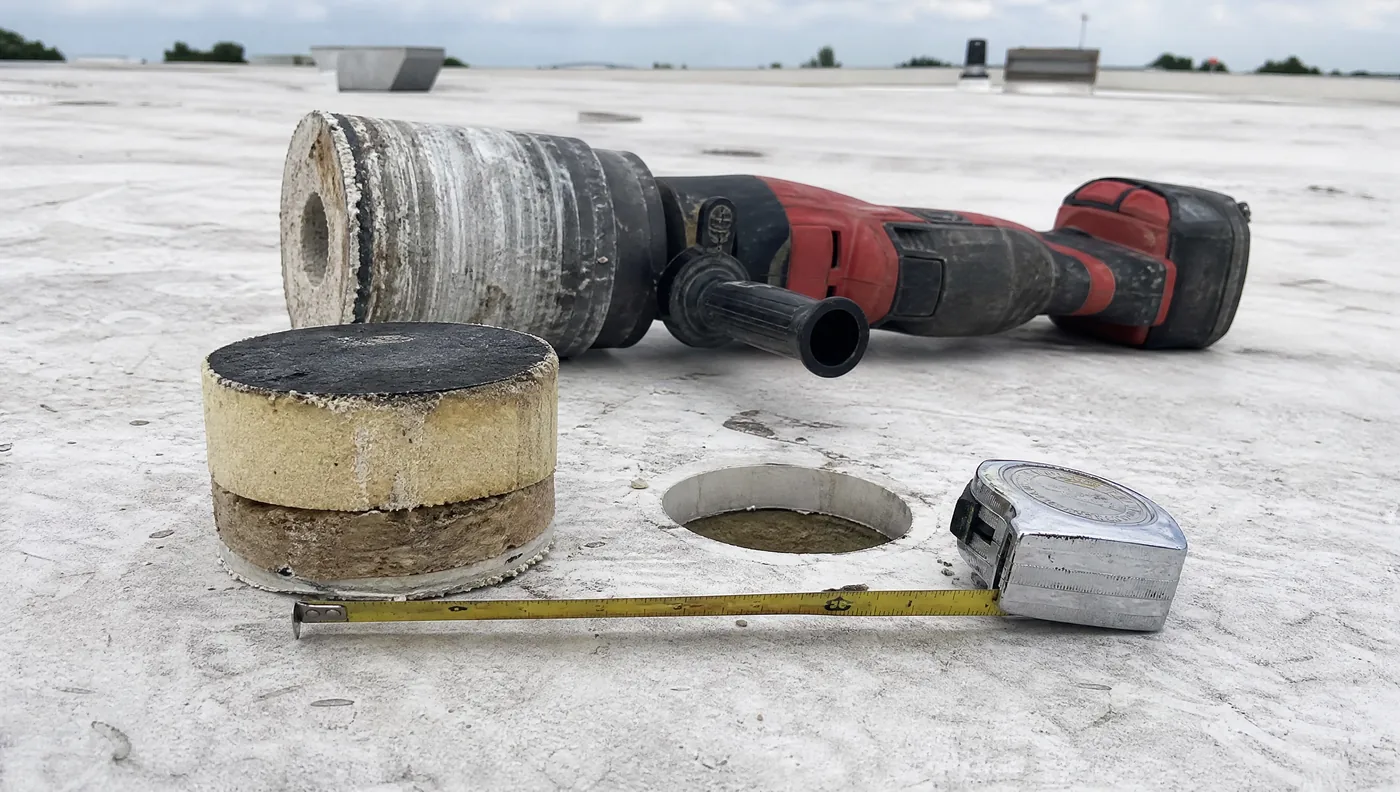 Core cut sample showing the layers of a Houston commercial roof assembly